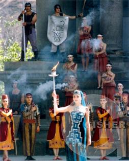Miss Armenia with the torch that will lit the Flame of the Games