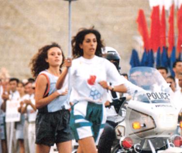 The torch is brought to the stadium